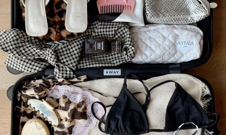 Férias à Vista! Descomplique Sua Bagagem: O Guia AMARO para a Mala de Mão Perfeita.