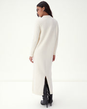 Midi dress in off-white knit medium front view showing column fit, long sleeves, and clean finish on the V-neckline