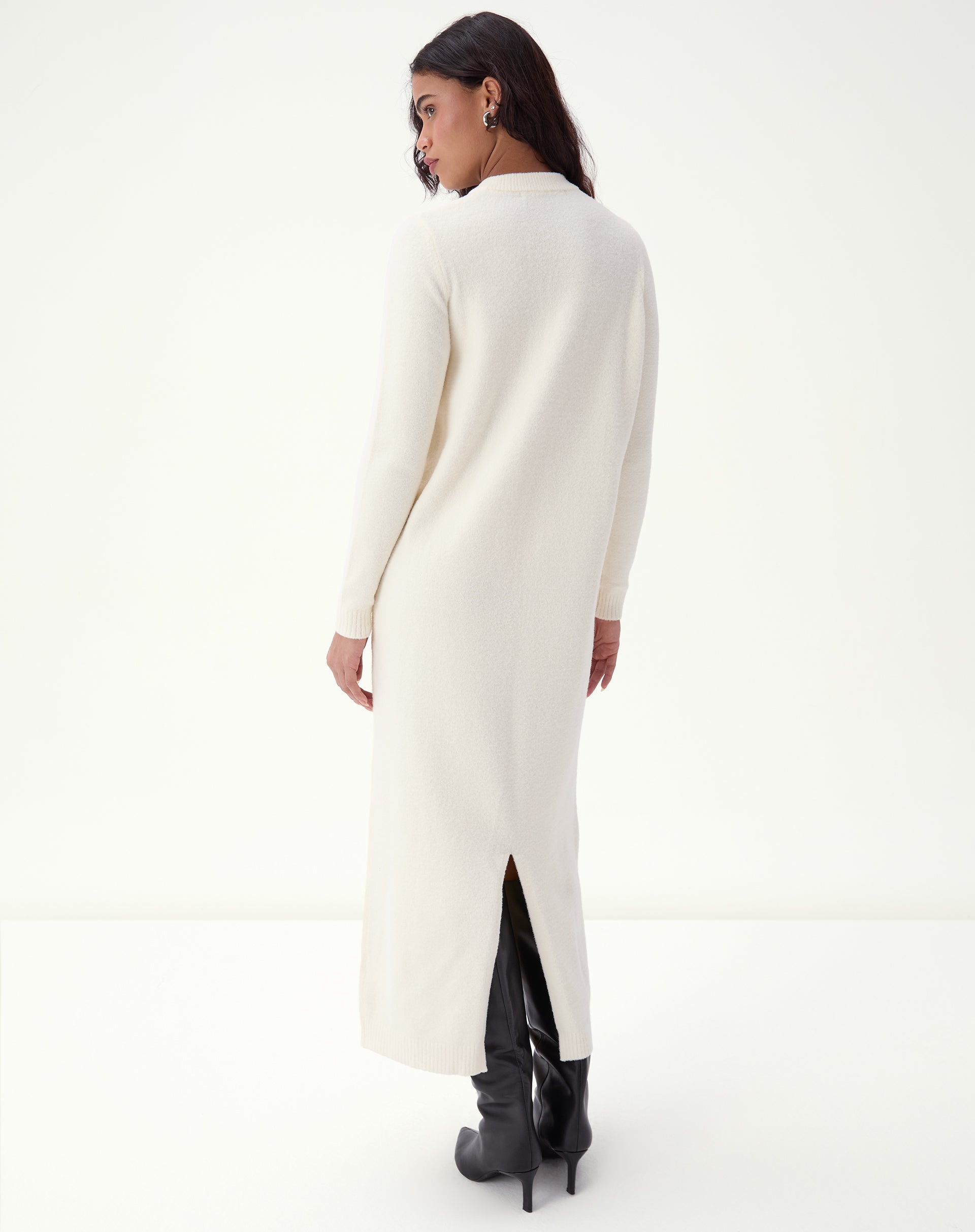Midi dress in off-white knit medium front view showing column fit, long sleeves, and clean finish on the V-neckline